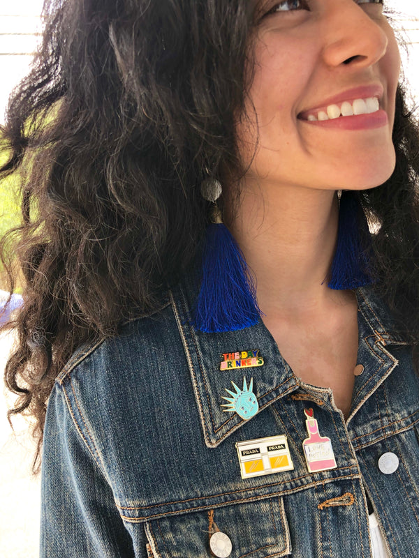 How to wear and style enamel pins